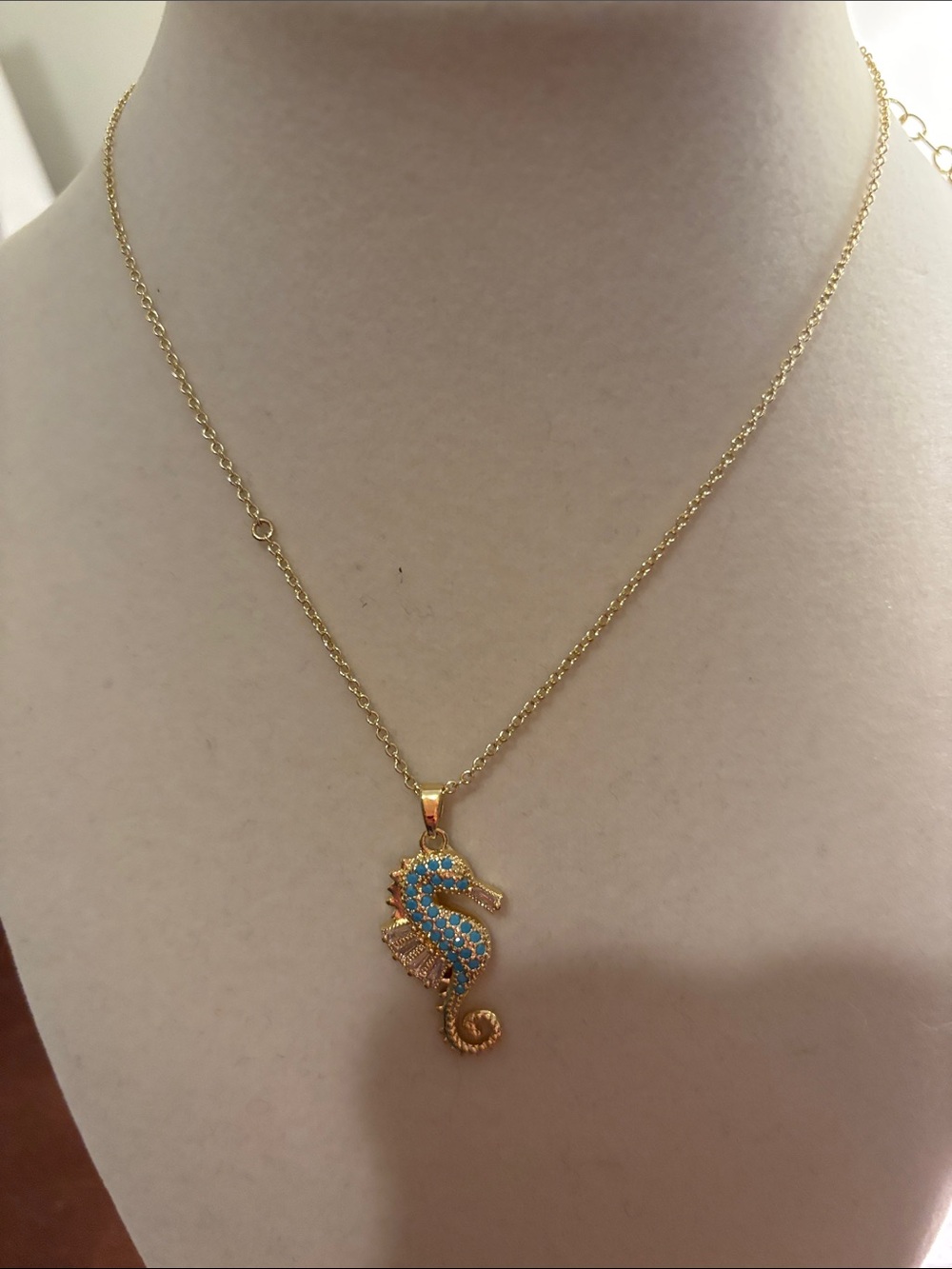 Gold Seahorse Pendant Necklace with Blue Crystal Accents